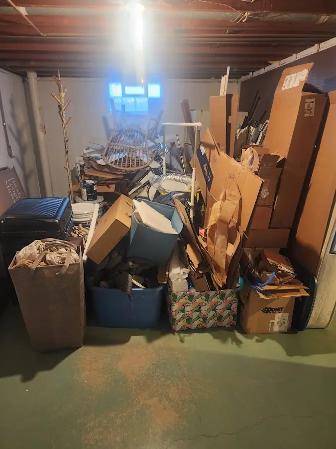 Roll-off dumpster container at job site for Yard Waste Dumpster Rental in Pearl River